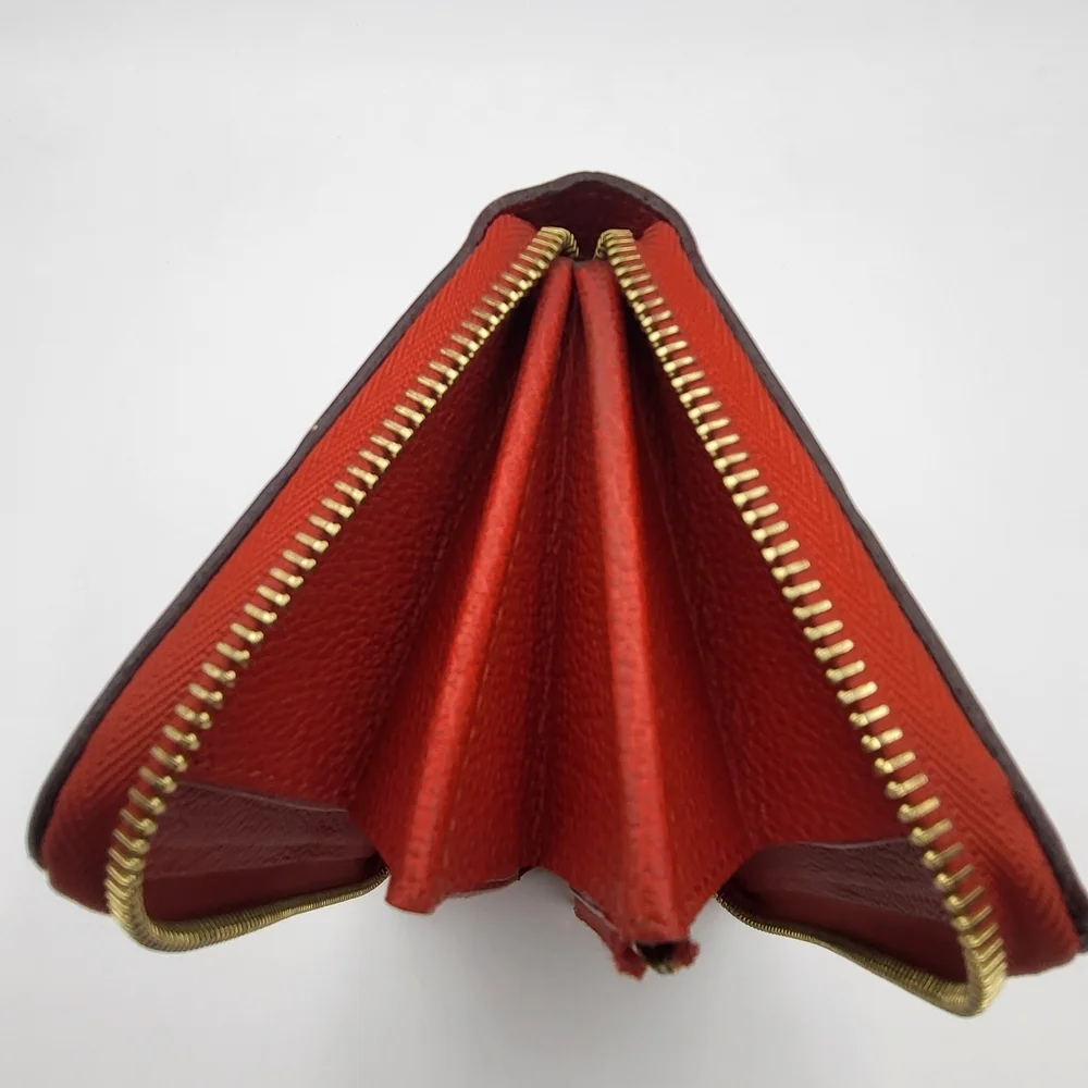 Louis Vuitton Portefeuille Clemence Empreinte Long Zippy Wallet,, authentic!!